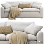 Light grey two-seater sofa with white and beige cushions and a beige throw blanket.