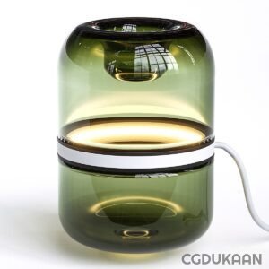 A modern translucent green lamp with a cylindrical shape, emitting warm yellow light from the middle section, and connected to a white power cord.