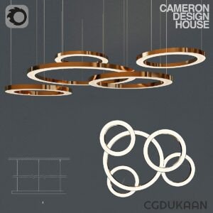 Modern chandelier design with five interlocking circular rings, suspended from the ceiling, emitting a warm golden light.