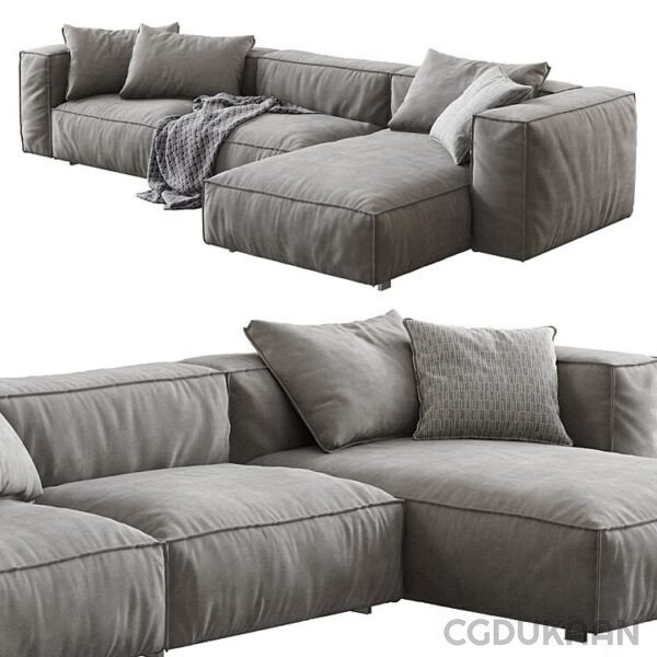 a grey couch with pillows