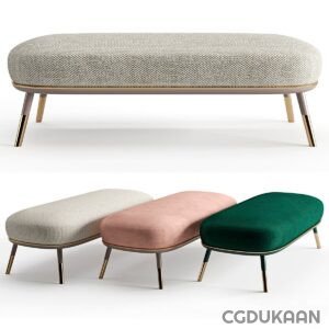 Three upholstered oval benches with brass legs, one in textured beige fabric, one in pink velvet, and one in green velvet.