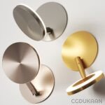 Four modern wall hooks in a combination of silver and gold finishes on a white background.