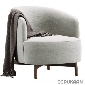 A light gray armchair with dark wooden legs and a dark gray throw blanket draped over one side.