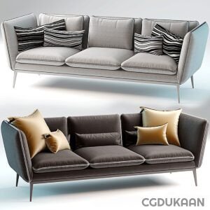 Two modern sofas with metal legs, one in light grey with black and white striped cushions, and the other in dark grey with beige pillows.