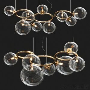 A modern chandelier with clear glass spheres and gold accents hanging from a dark ceiling.