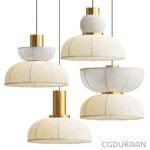 Four modern pendant lights with white fabric shades and gold accents hanging from the ceiling.