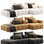 a group of couches with pillows