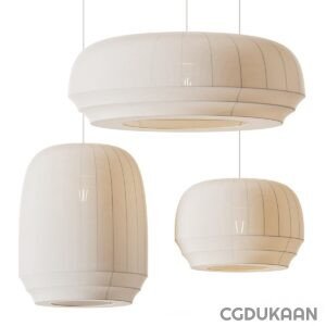 Three white fabric pendant lights of different sizes hanging against a light background.