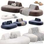 Various couches in different colors and styles, adorned with a variety of decorative pillows.