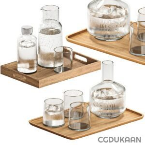 Three glassware and a water-filled tray on a table.