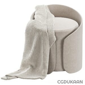 A chair with a cozy blanket draped over it, creating a warm and inviting atmosphere.