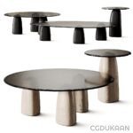 Three tables of various shapes and sizes.