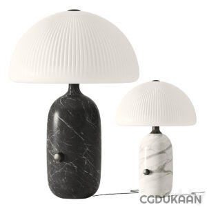 Two modern black and white lamps with a white dome, perfect for contemporary interior design.