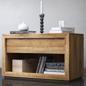 A wooden nightstand adorned with books and candles, creating a cozy and inviting atmosphere in a bedroom setting.