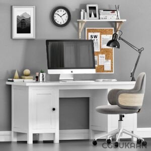 A white desk featuring a computer and a chair, creating a clean and modern workspace environment.