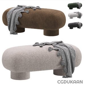 A large ottoman adorned with a cozy blanket and a stylish scarf, creating a warm and inviting atmosphere.