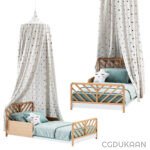 A beautifully designed canopy bed featuring elegant drapes, creating a cozy and inviting sleeping space.